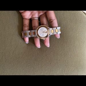 Movado bold two tone watch.